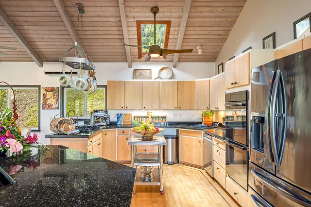 a kitchen with granite countertop lots of counter top space