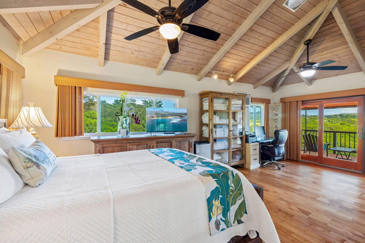 3307 D Hailima Road Koloa, HI 96756 - Photo 9 of 30 a bed sitting in a spacious bedroom next to a large window