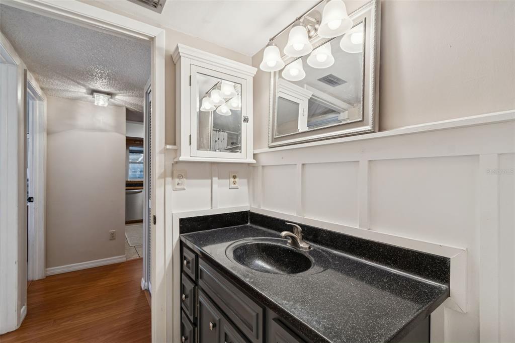 2618 Cedar View Court, Unit 95B Clearwater, FL 33761 - Photo 24 of 43 a kitchen with a sink stove and refrigerator