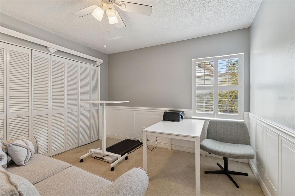 2618 Cedar View Court, Unit 95B Clearwater, FL 33761 - Photo 25 of 43 a work room with furniture and windows