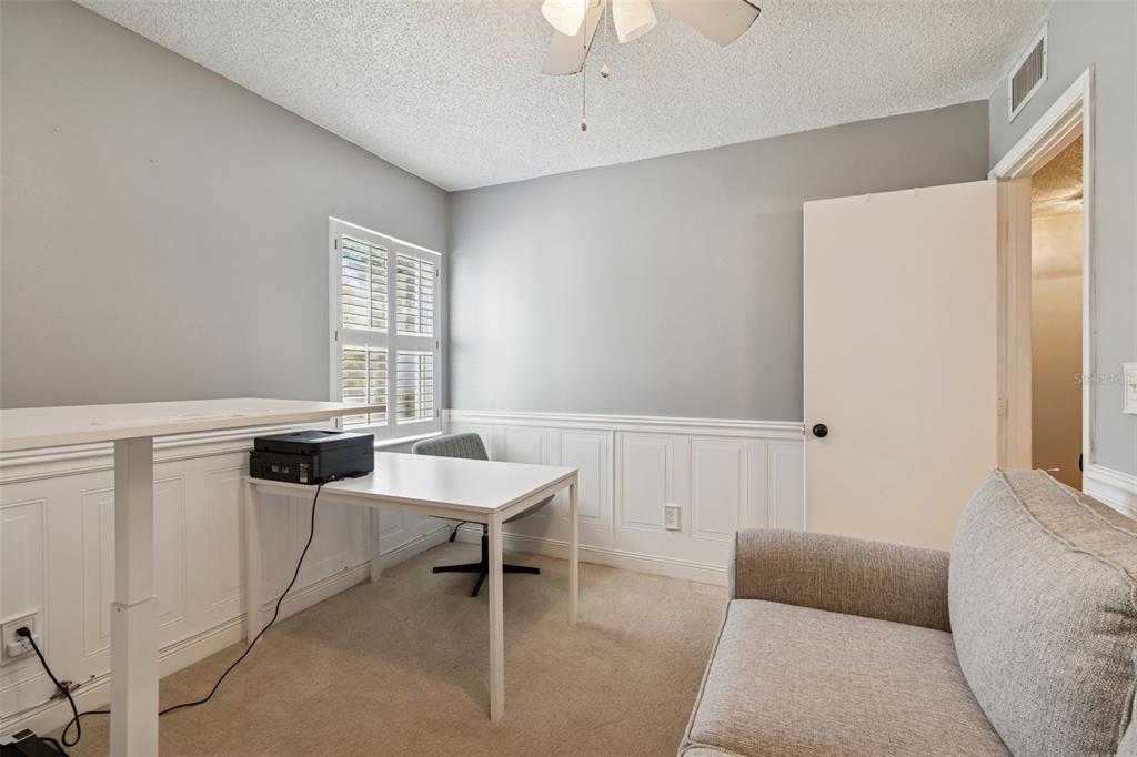 2618 Cedar View Court, Unit 95B Clearwater, FL 33761 - Photo 26 of 43 a bedroom with furniture and a window