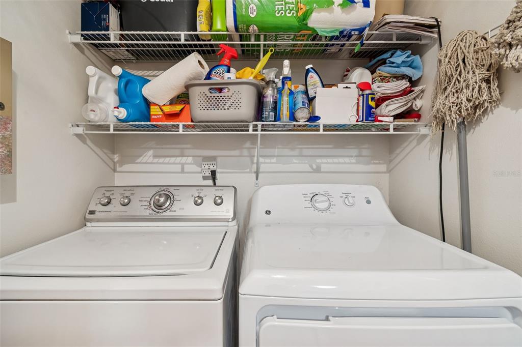 2618 Cedar View Court, Unit 95B Clearwater, FL 33761 - Photo 28 of 43 a utility room with dryer and washer