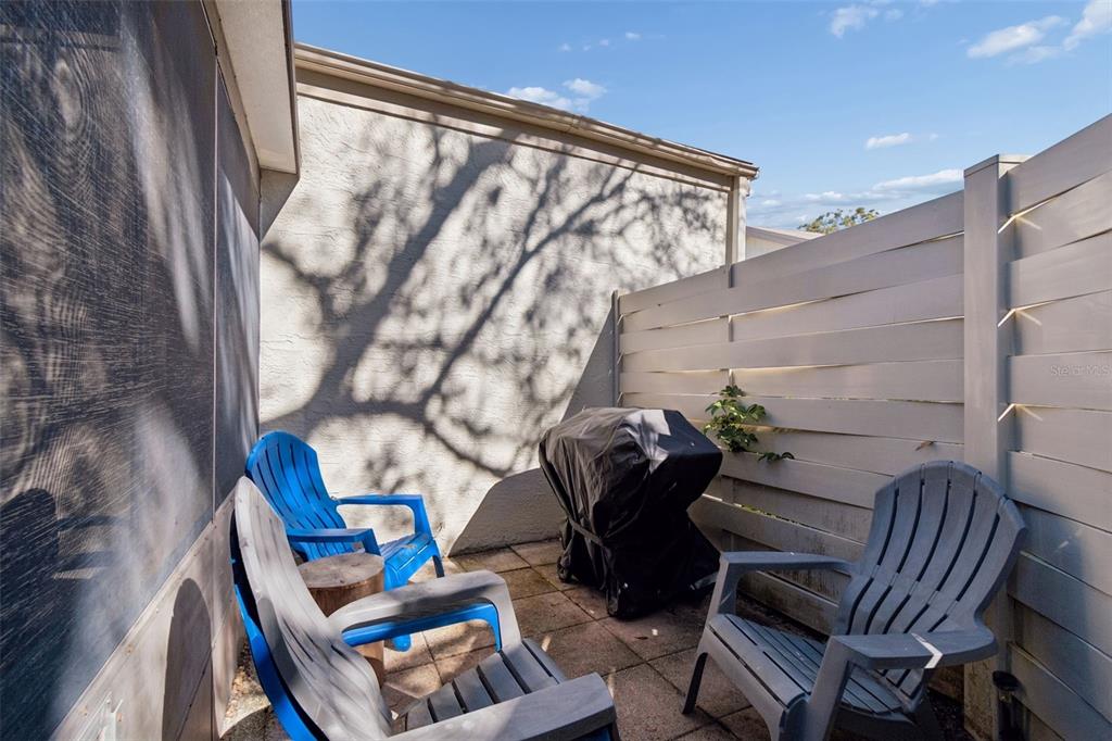 2618 Cedar View Court, Unit 95B Clearwater, FL 33761 - Photo 33 of 43 a view of deck with patio