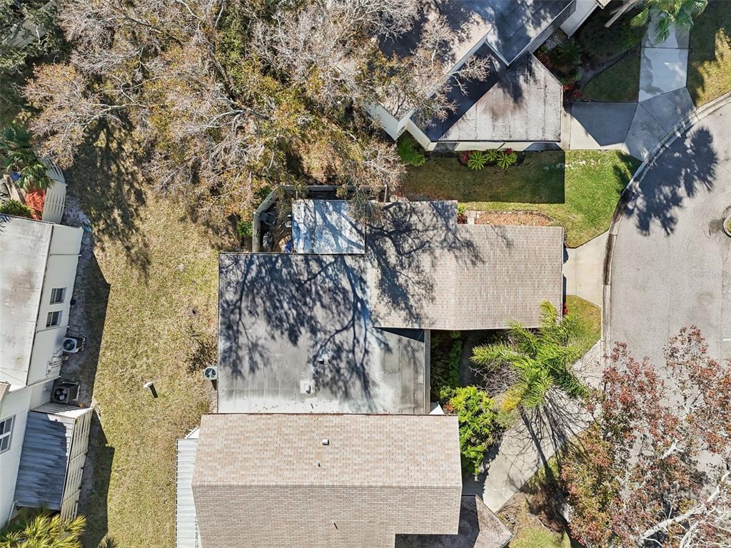 2618 Cedar View Court, Unit 95B Clearwater, FL 33761 - Photo 38 of 43 an aerial view of a house with a yard