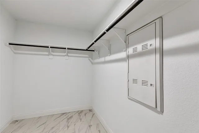 a bathroom with a sink a vanity and a mirror