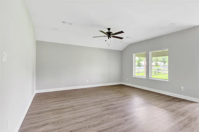 a view of kitchen with sink microwave and refrigerator