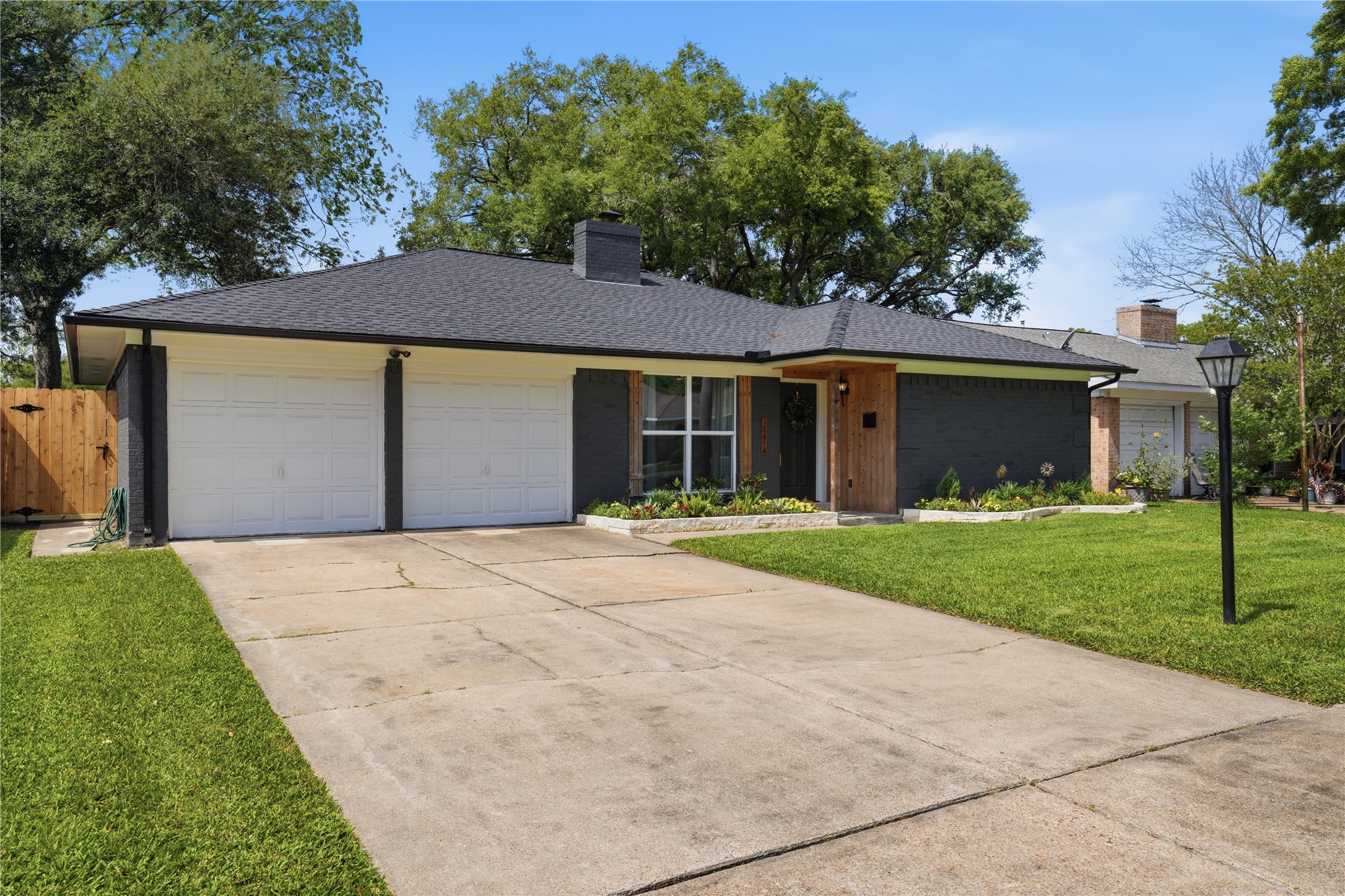 15614 Rill Lane Houston, TX 77062 - Photo 2 of 35 Driveway view of house