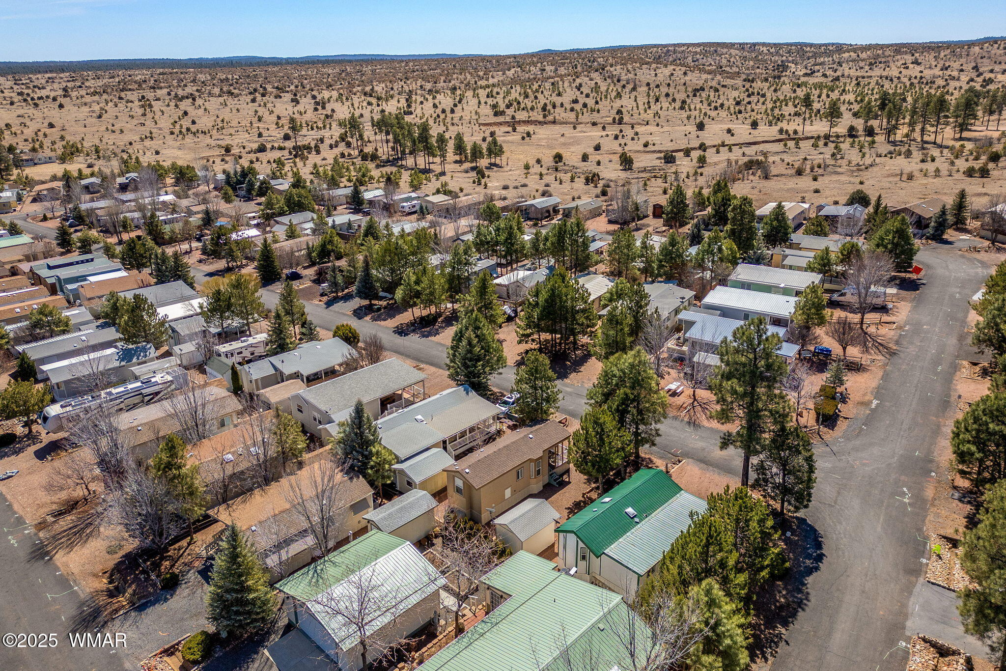 2206 Wrangler Way Overgaard, AZ 85933 - Photo 22 of 38 an aerial view of a city