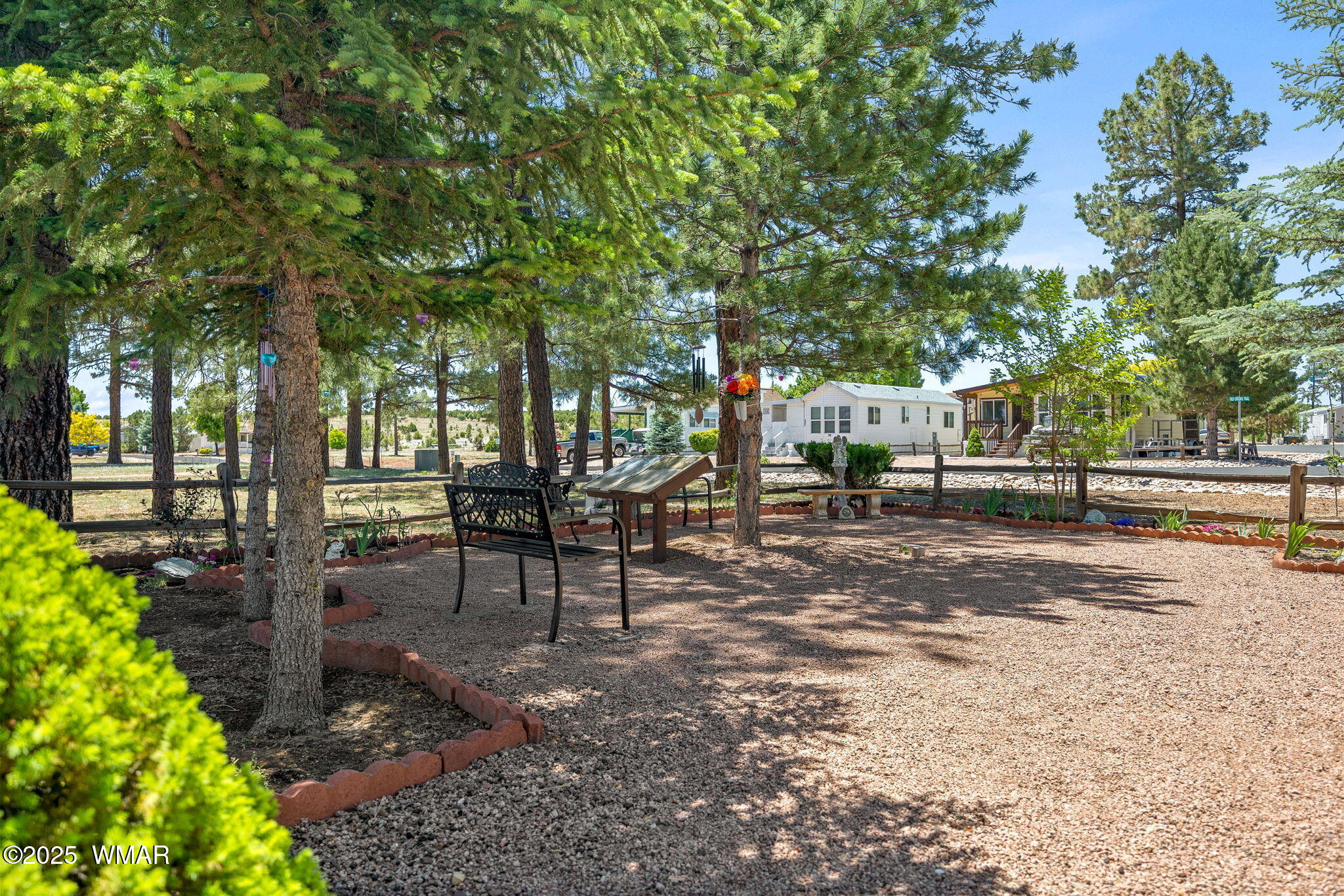 2206 Wrangler Way Overgaard, AZ 85933 - Photo 33 of 38 a view of park with bench and trees
