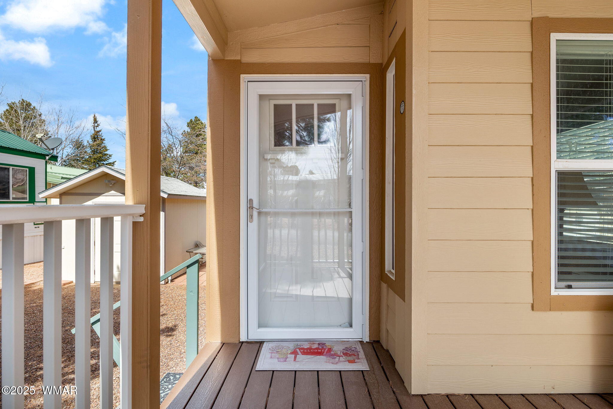 2206 Wrangler Way Overgaard, AZ 85933 - Photo 7 of 38 a view of a balcony with wooden floor