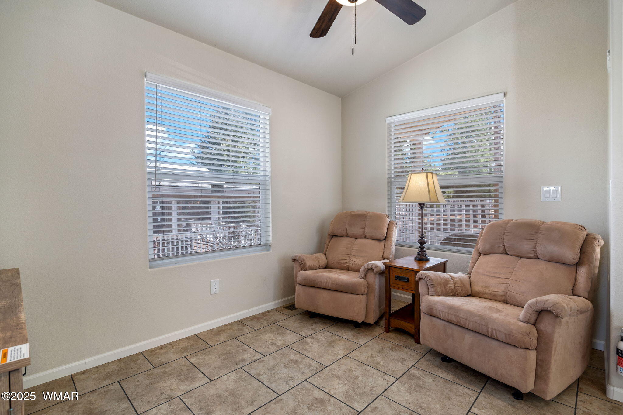 2206 Wrangler Way Overgaard, AZ 85933 - Photo 9 of 38 a living room with furniture and a window