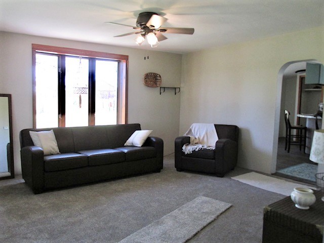 21945 Pilgrim Road Chadwick, IL 61014 - Photo 15 of 24 a living room with furniture and a large window