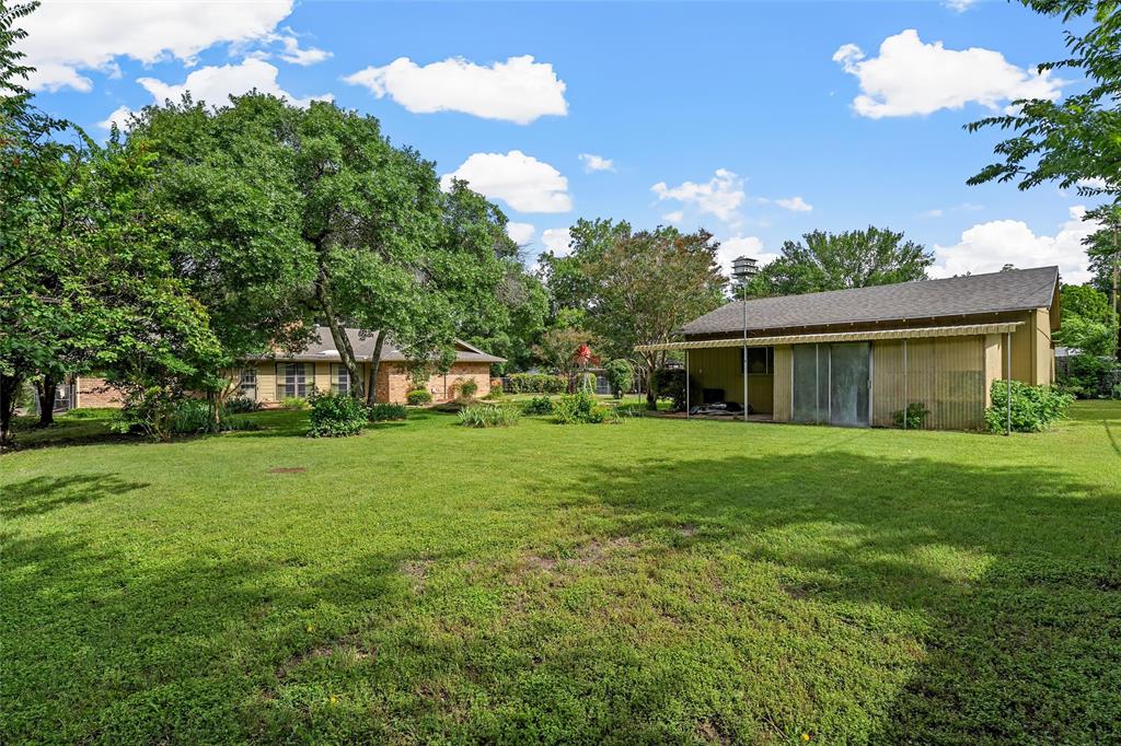 219 Opal Street Hewitt, TX 76643 - Photo 27 of 28 a front view of a house with a garden