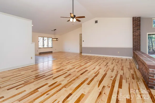 a kitchen with a refrigerator and cabinets