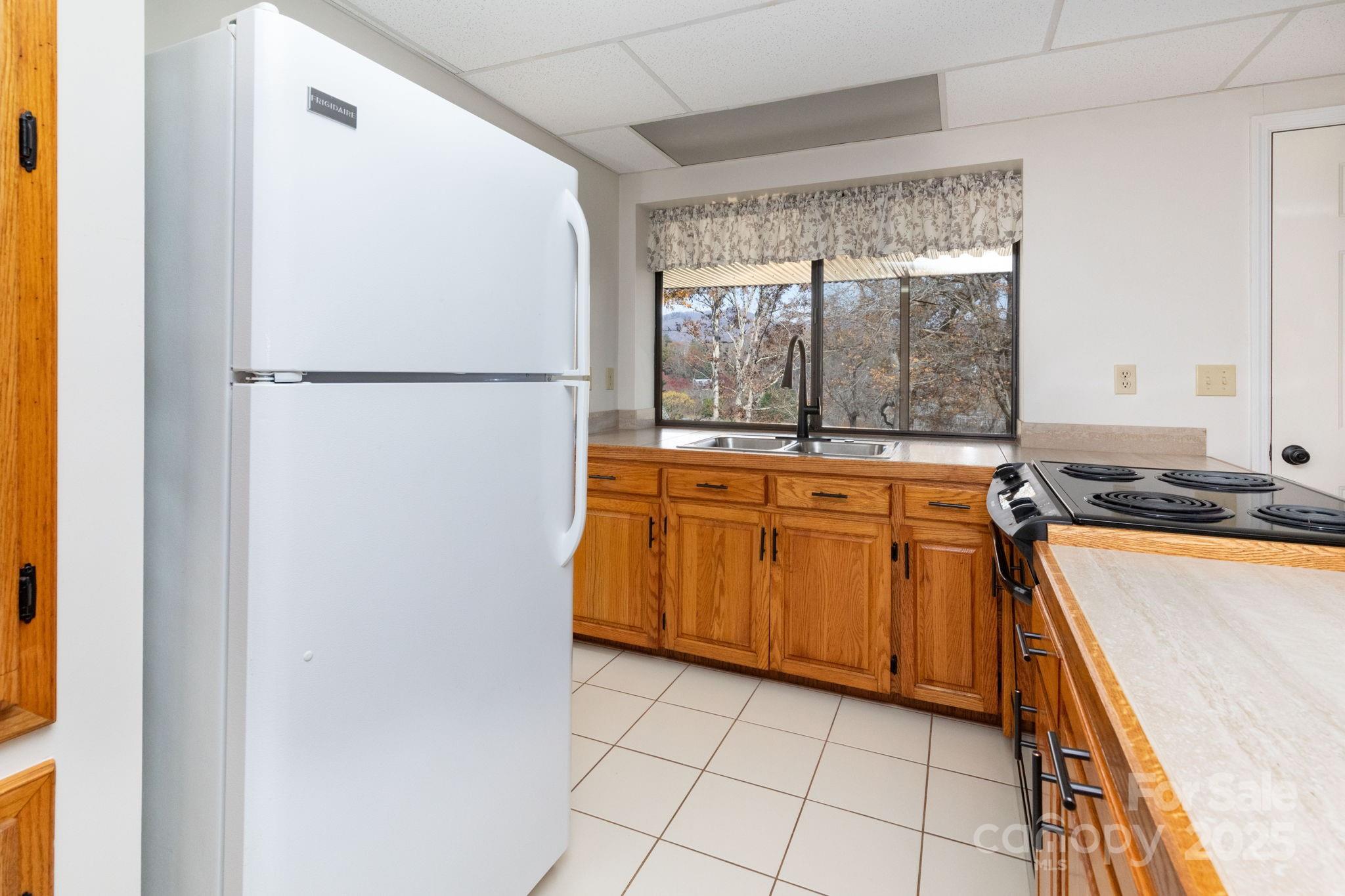 84 Joe Jenkins Road Fairview, NC 28730 - Photo 18 of 26 a room with storage and utility