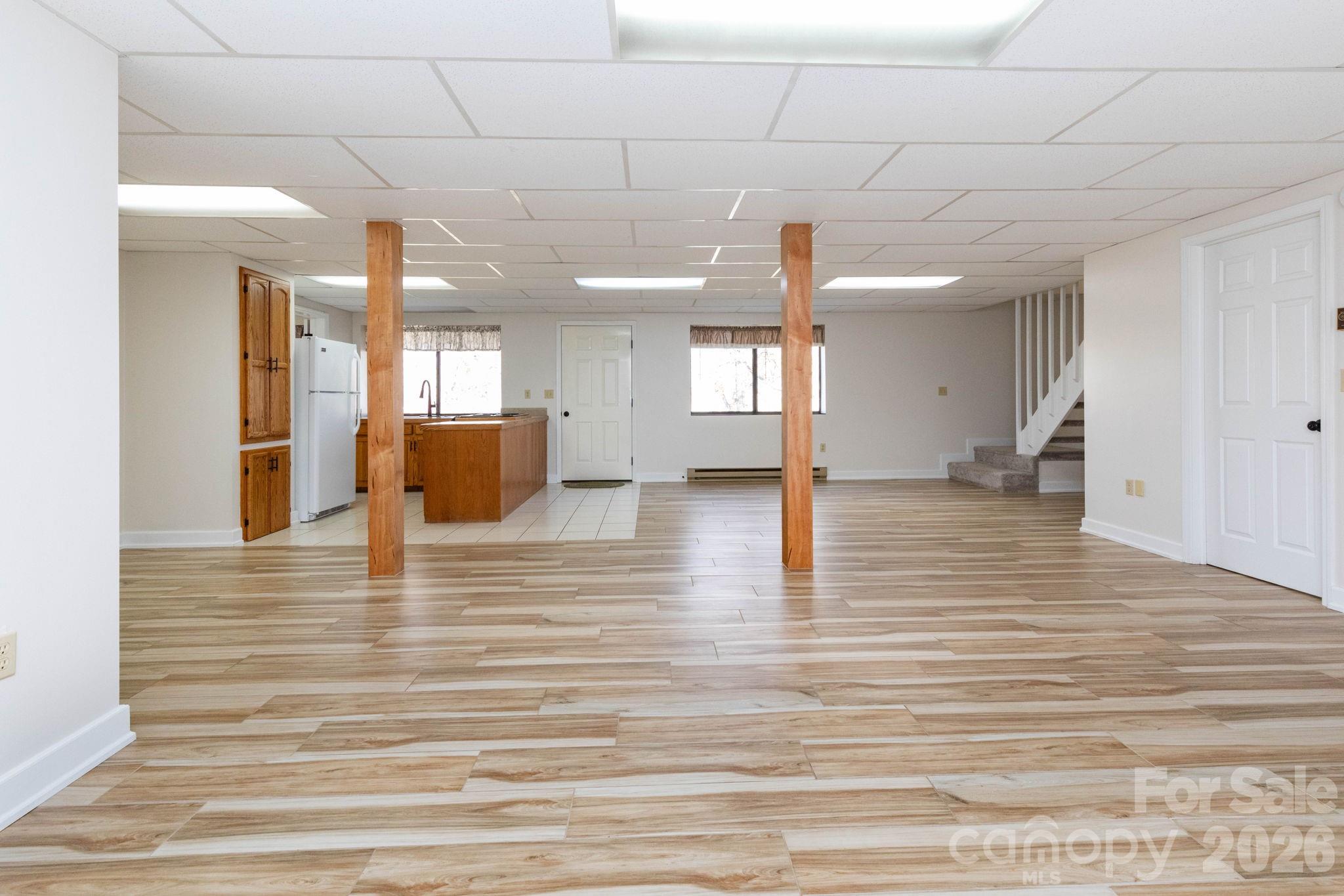 84 Joe Jenkins Road Fairview, NC 28730 - Photo 20 of 26 a view of a room with wooden floor