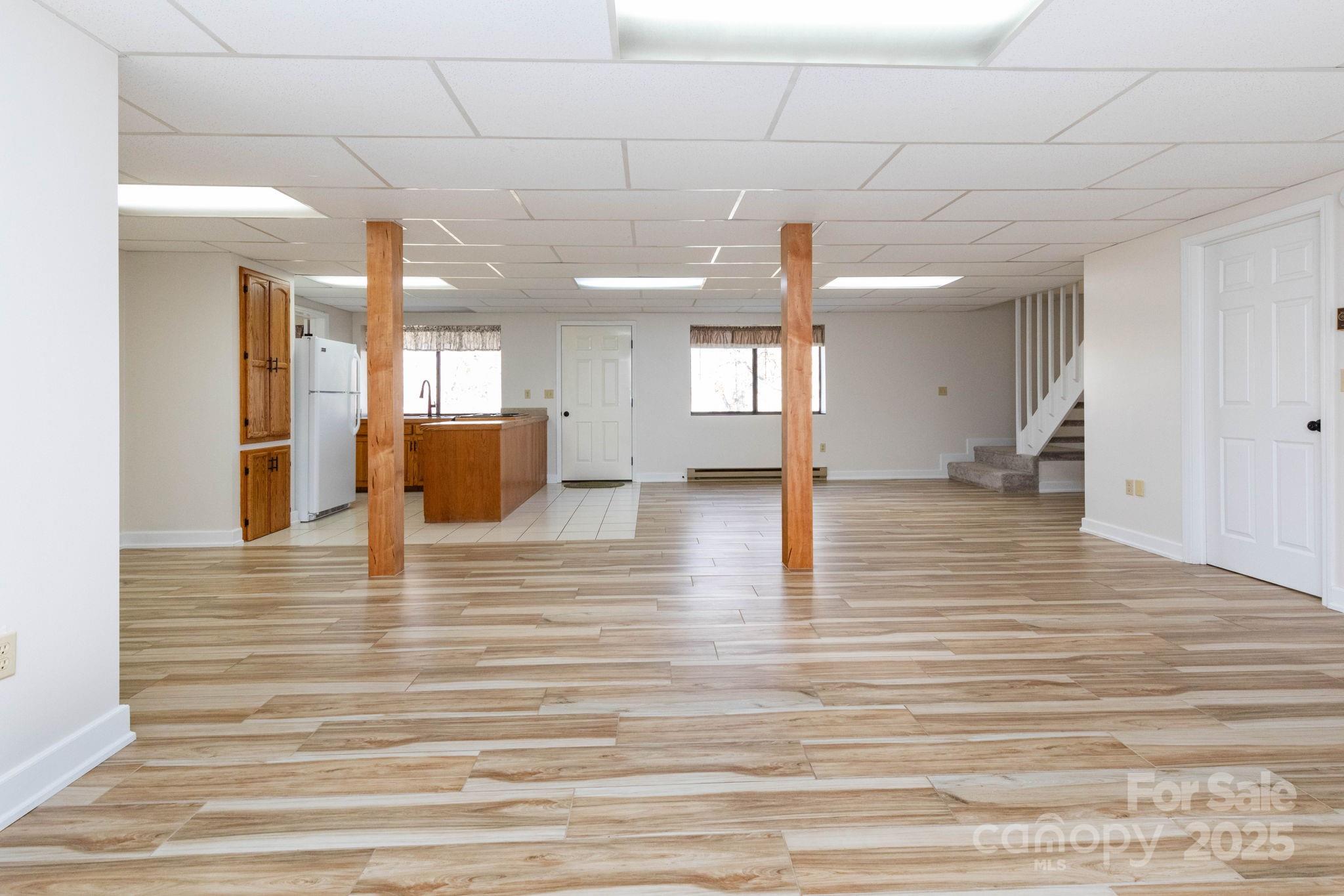 84 Joe Jenkins Road Fairview, NC 28730 - Photo 20 of 26 a view of a room with wooden floor