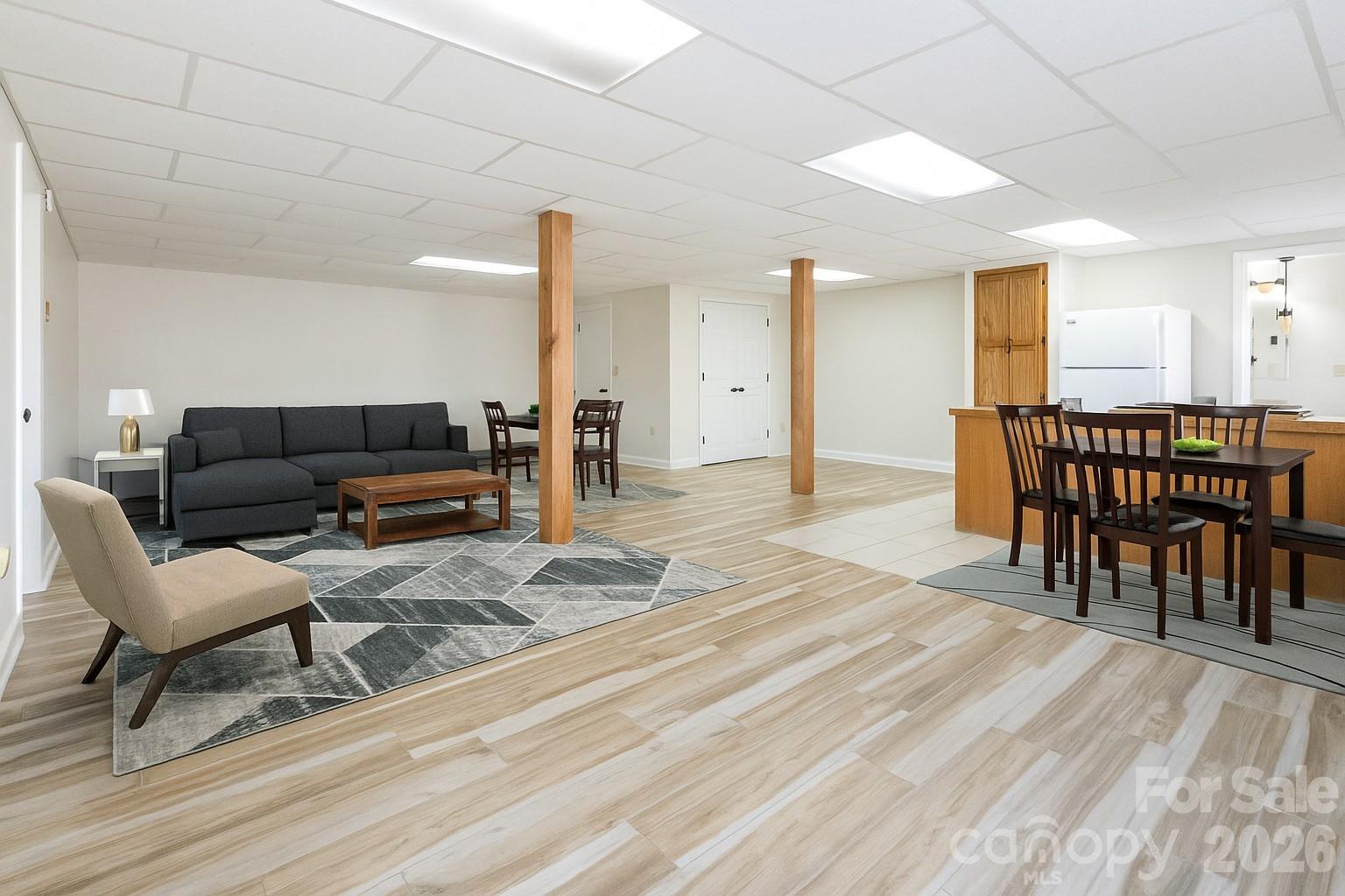 84 Joe Jenkins Road Fairview, NC 28730 - Photo 21 of 26 a living room with furniture and a wooden floor