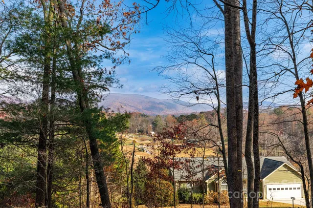 a view of a balcony with chairs