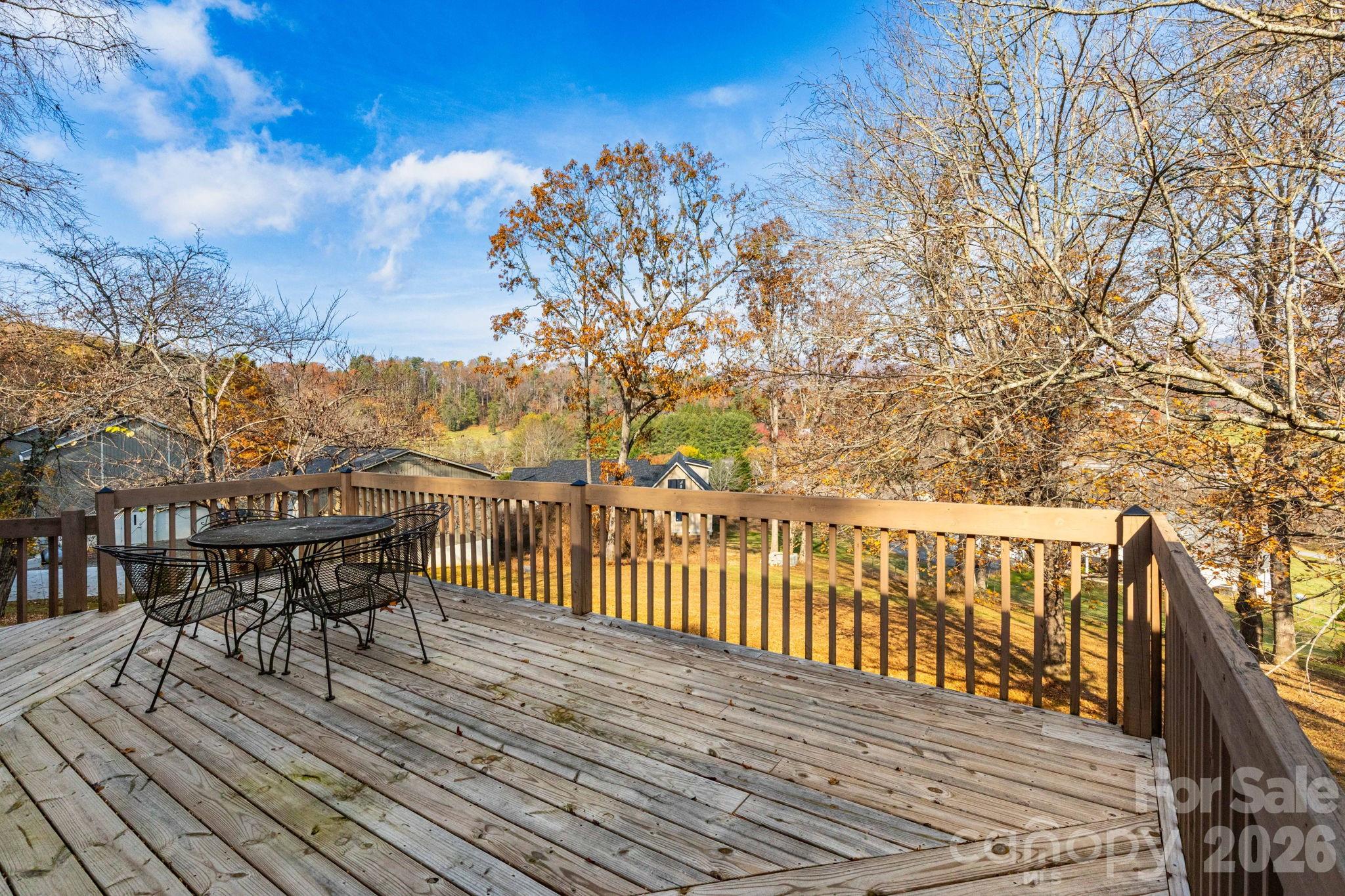 84 Joe Jenkins Road Fairview, NC 28730 - Photo 7 of 26 a view of a balcony with chairs
