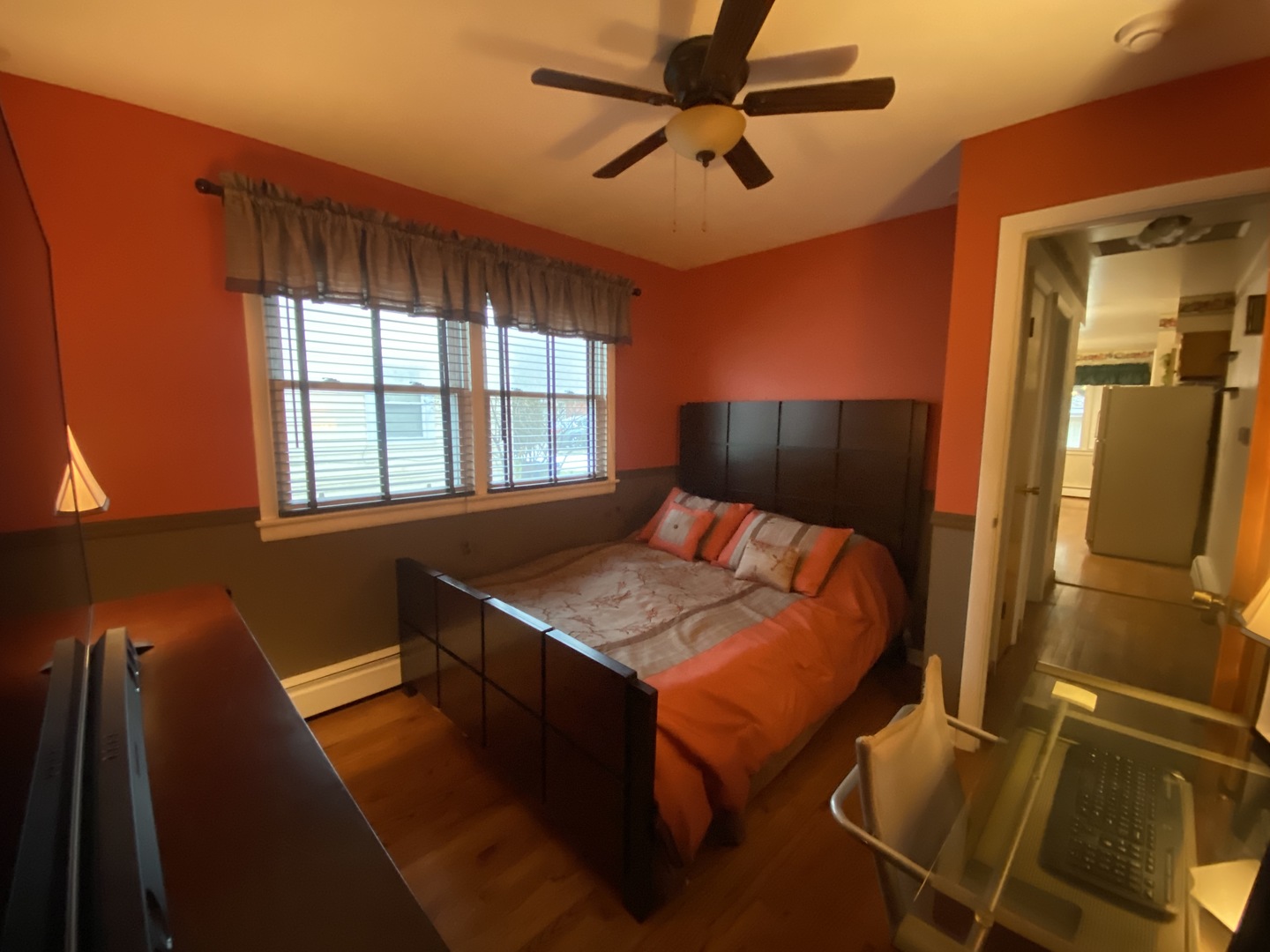 2050 Atwood Avenue Berkeley, IL 60163 - Photo 12 of 23 a bedroom with a bed and a chandelier