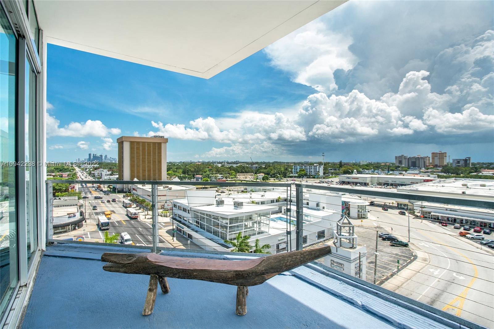 8101 Biscayne Boulevard, Unit R705 Miami, FL 33138 - Photo 11 of 32 a view of a terrace with seating area