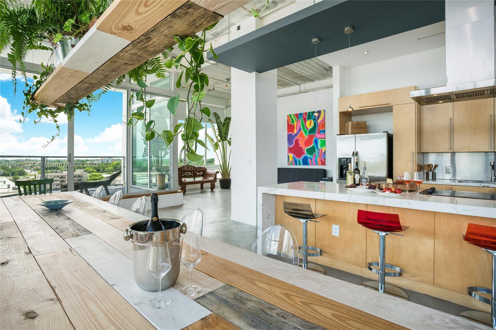 8101 Biscayne Boulevard, Unit R705 Miami, FL 33138 - Photo 16 of 32 a outdoor space with lots of table and chairs