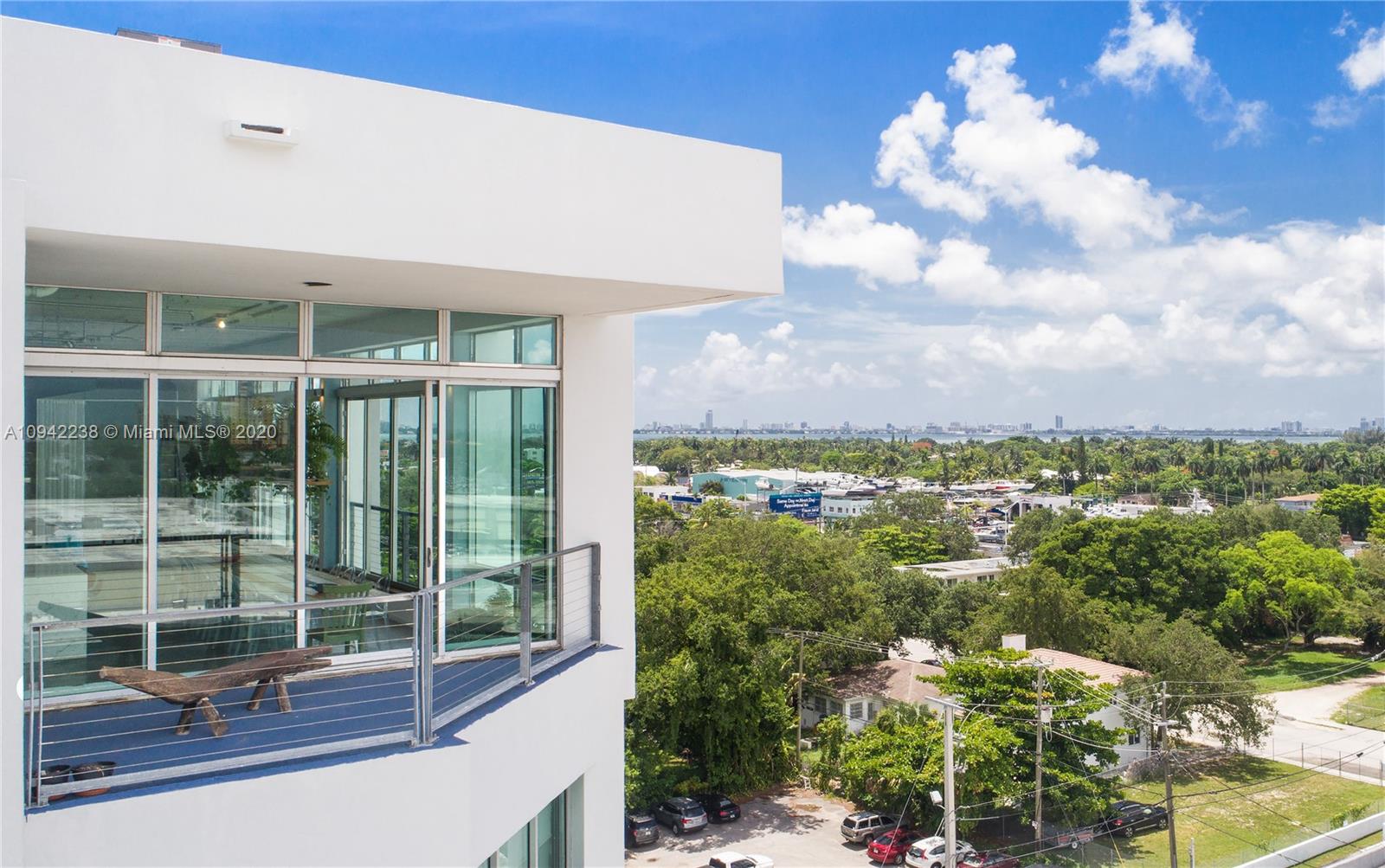 8101 Biscayne Boulevard, Unit R705 Miami, FL 33138 - Photo 21 of 32 a view of a city from a corridor