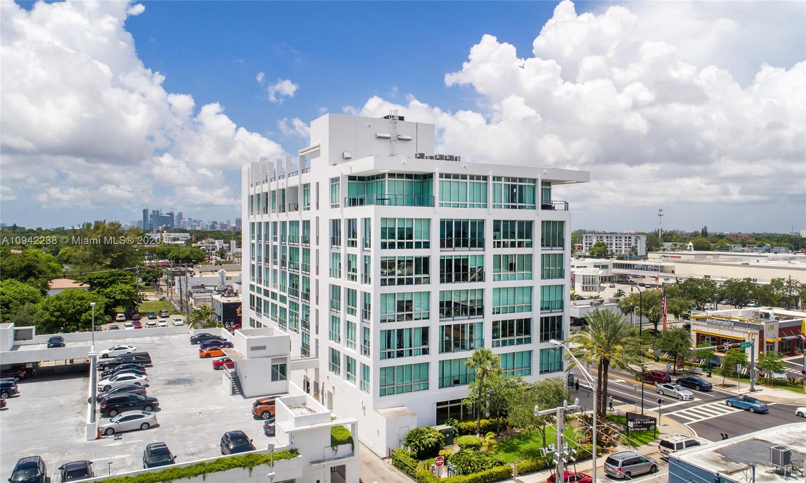8101 Biscayne Boulevard, Unit R705 Miami, FL 33138 - Photo 28 of 32 a view of a city that has tall buildings