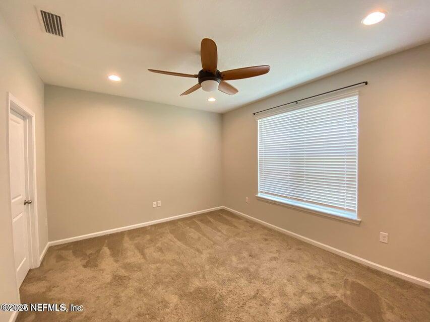 534 Pine Bluff Drive St. Augustine, FL 32092 - Photo 23 of 30 a view of an empty room with a window