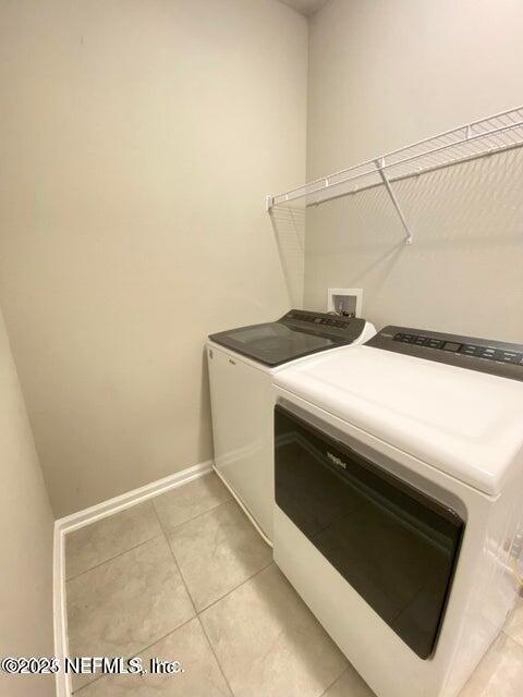 534 Pine Bluff Drive St. Augustine, FL 32092 - Photo 25 of 30 a utility room with dryer and washer