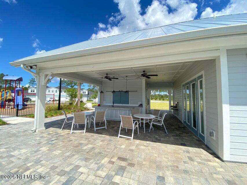 534 Pine Bluff Drive St. Augustine, FL 32092 - Photo 28 of 30 a view of a dining room with furniture window and outside view