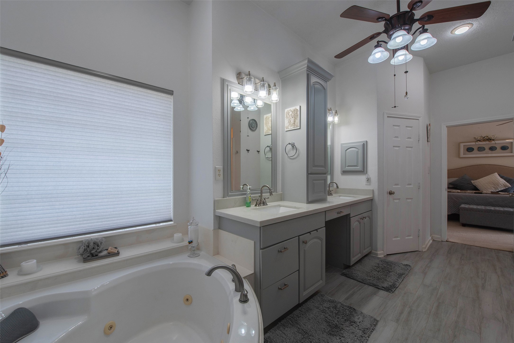 32315 Grove Park Road Waller, TX 77484 - Photo 14 of 40 Spacious primary bath featuring double sinks, a separate whirlpool tub, and walk-in shower.