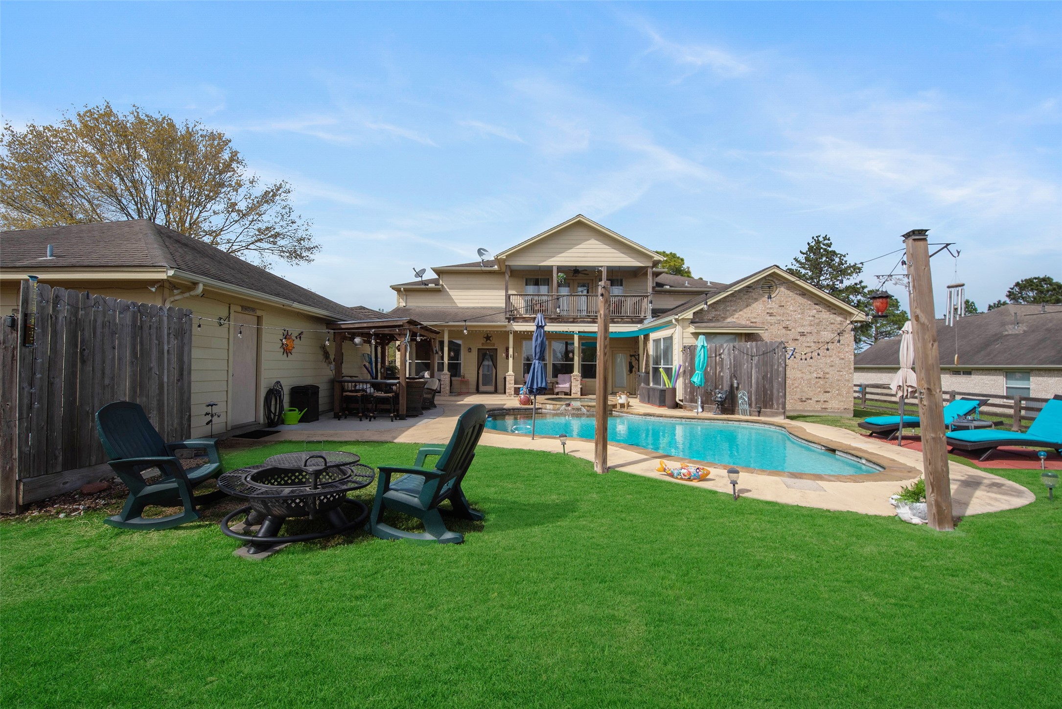 32315 Grove Park Road Waller, TX 77484 - Photo 27 of 40 Resort-style backyard with in-ground gunite pool and spa