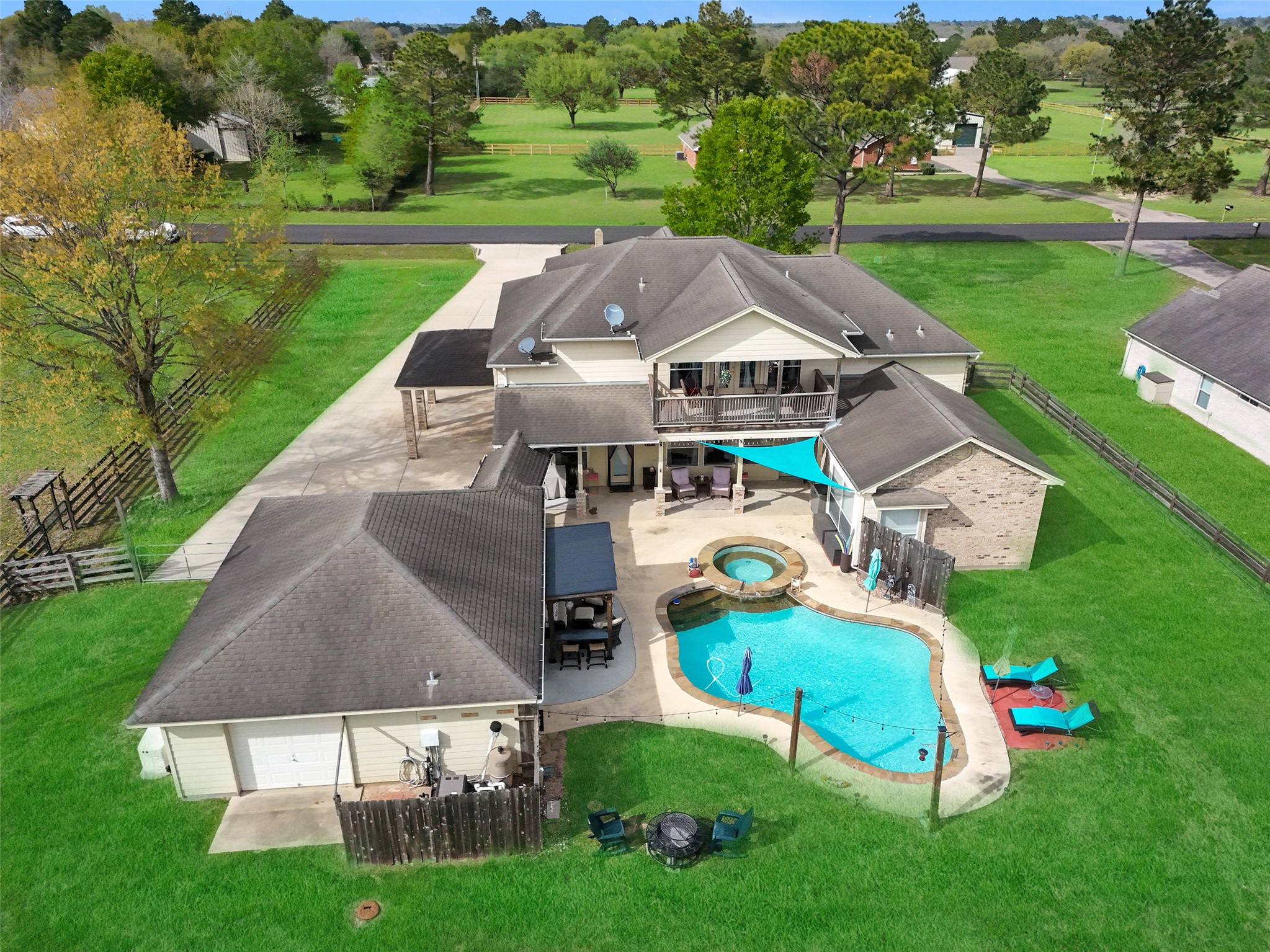 32315 Grove Park Road Waller, TX 77484 - Photo 3 of 40 Aerial view highlighting full 1-acre property 2-car detached garage with two bay doors home, pool, and barn.