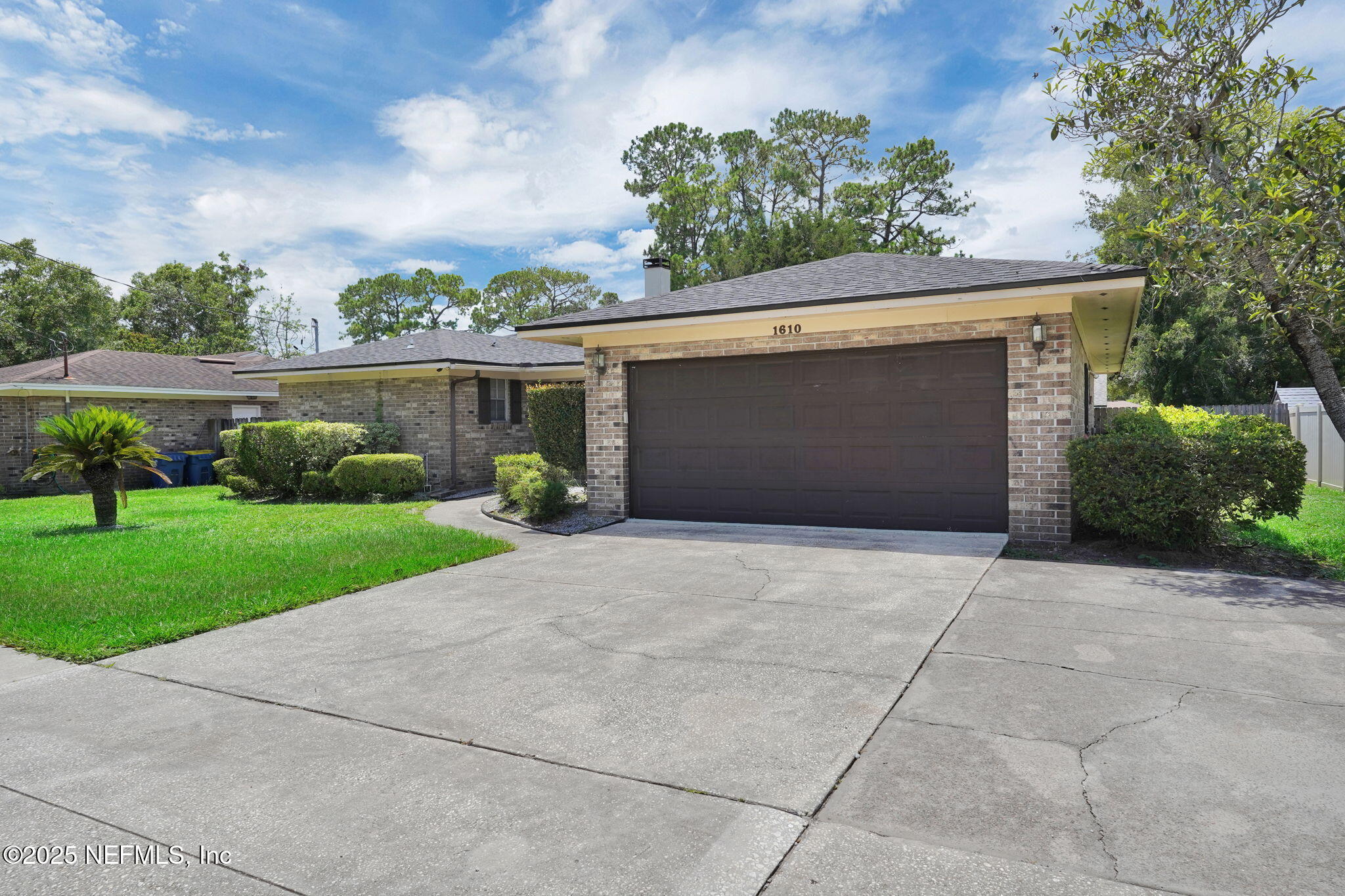 1610 Derringer Road Jacksonville, FL 32225 - Photo 2 of 29 front view of a house with a yard