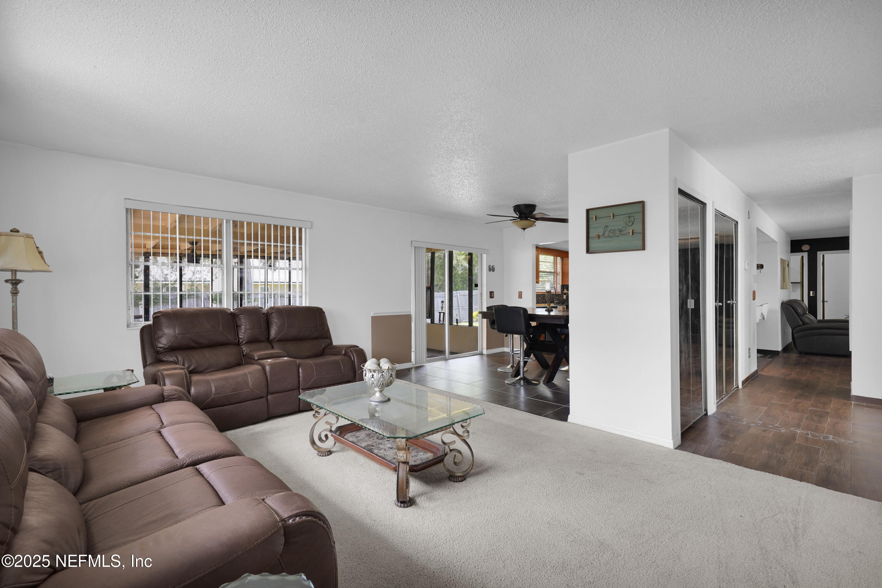 1610 Derringer Road Jacksonville, FL 32225 - Photo 6 of 29 a living room with furniture and a window