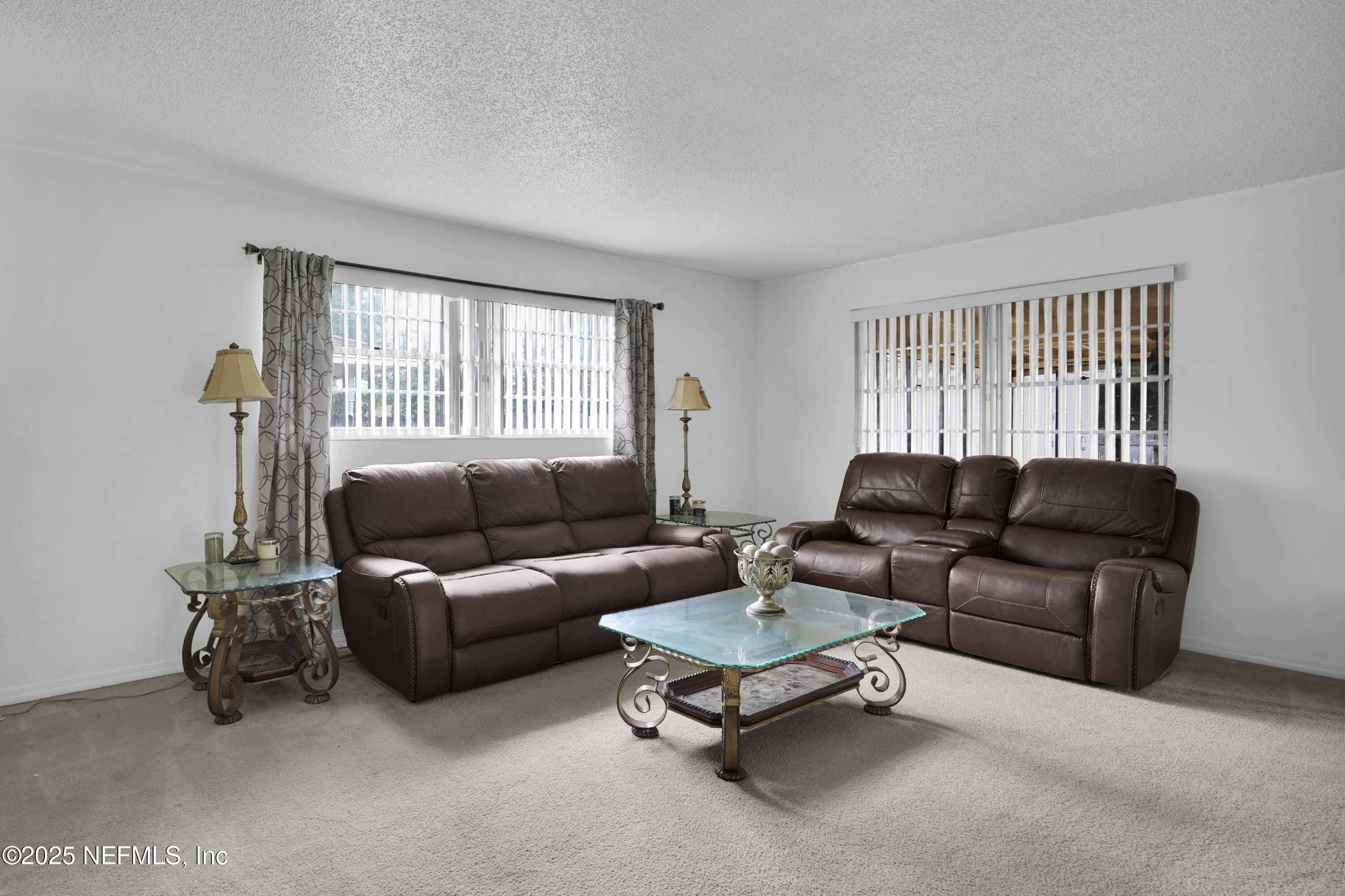 1610 Derringer Road Jacksonville, FL 32225 - Photo 9 of 29 a living room with furniture and a window