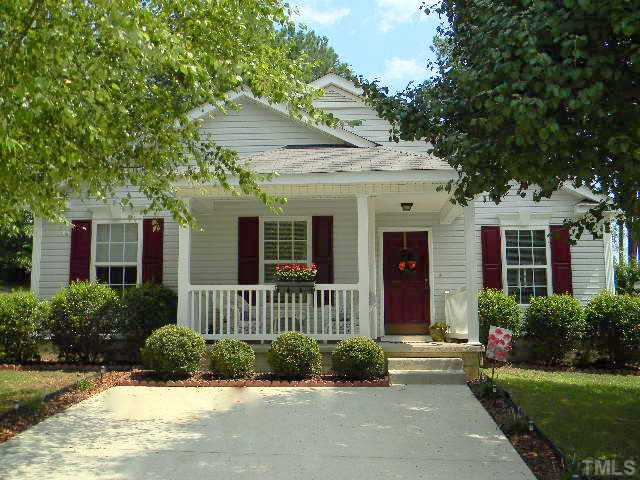 Beautifully maintained home w/ landscaping, covered rocking chair front porch, easy to maintain vinyl siding, hardwood trees to provide ample shading in the summer in a great neighborhood that's convenient to everything you could need!