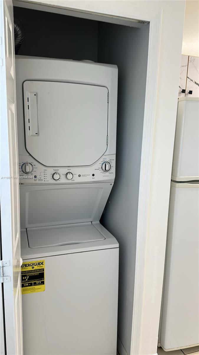 2910 Southeast 12th Road, Unit 20429 Homestead, FL 33035 - Photo 15 of 25 a utility room with dryer and washer