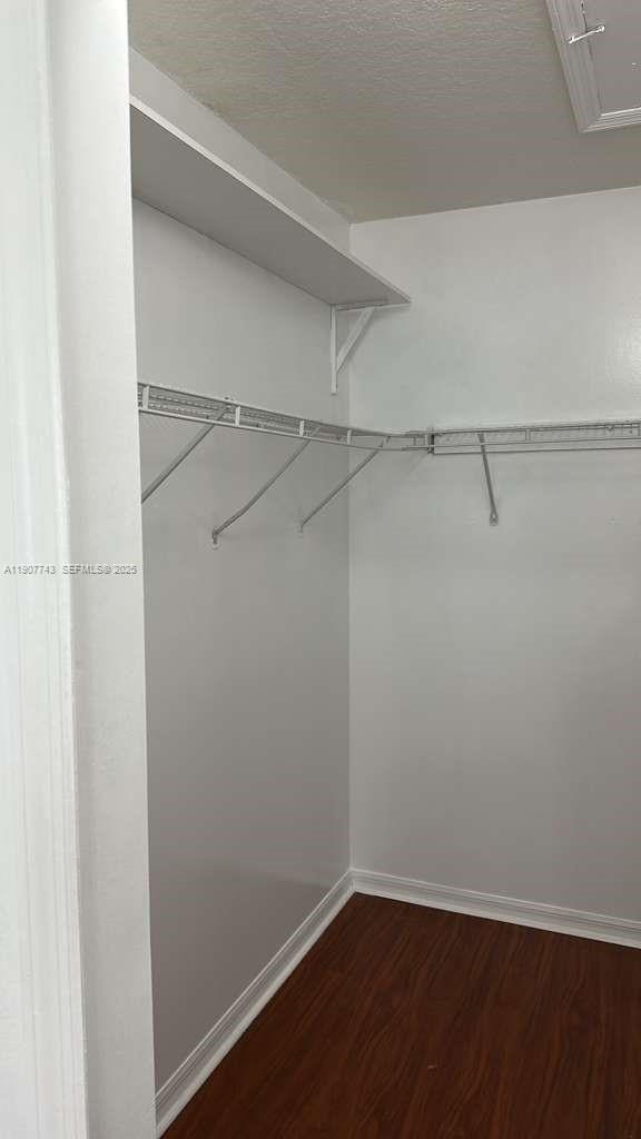 2910 Southeast 12th Road, Unit 20429 Homestead, FL 33035 - Photo 21 of 25 a view of an empty walk in closet