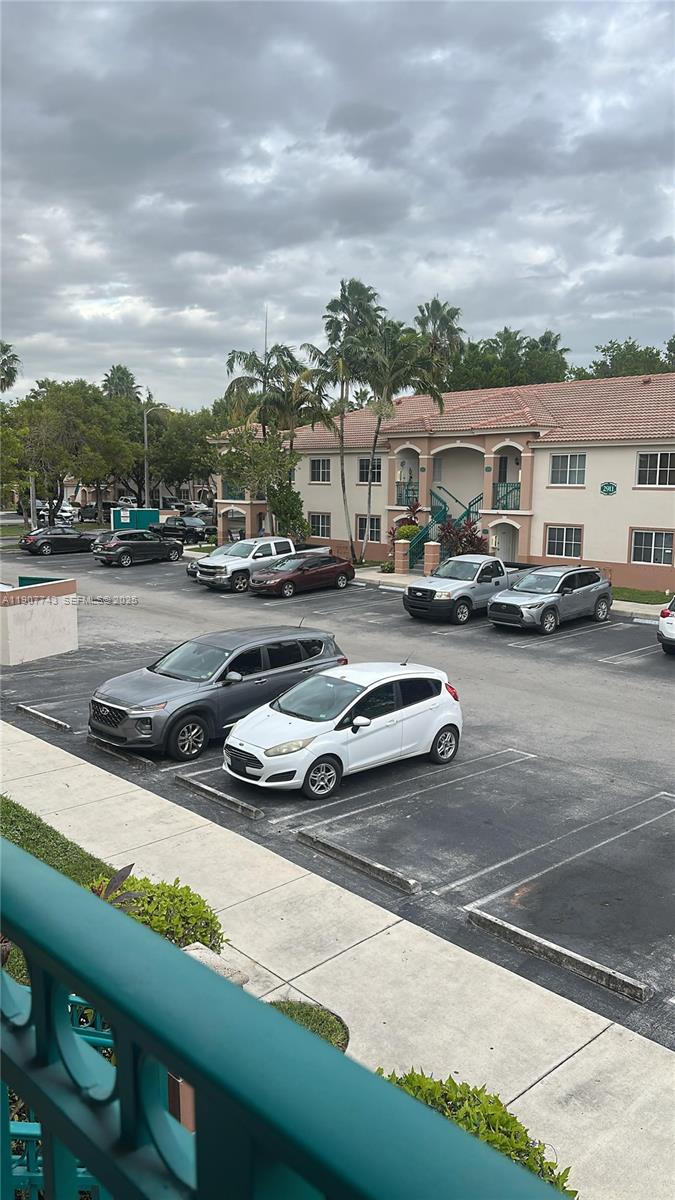 2910 Southeast 12th Road, Unit 20429 Homestead, FL 33035 - Photo 5 of 25 a view of a city street with cars