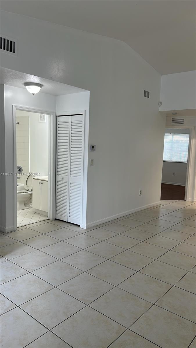 2910 Southeast 12th Road, Unit 20429 Homestead, FL 33035 - Photo 9 of 25 a view of a livingroom with an empty space and a bathroom