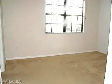 7423 Bristol Circle Naples, FL 34120 - Photo 6 of 6 Spare room with baseboards