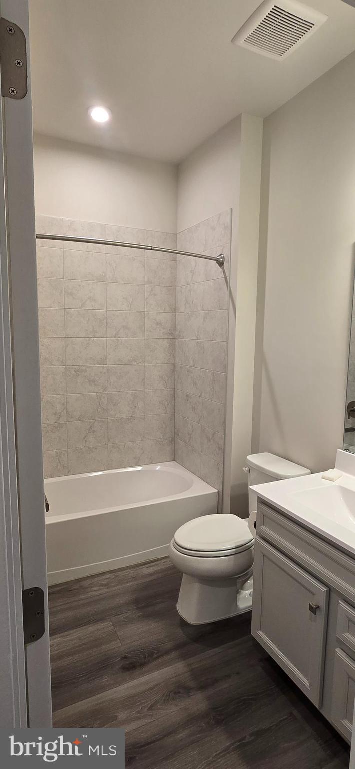 357 Marquis Street Frederick, MD 21702 - Photo 14 of 23 a bathroom with a sink and a toilet