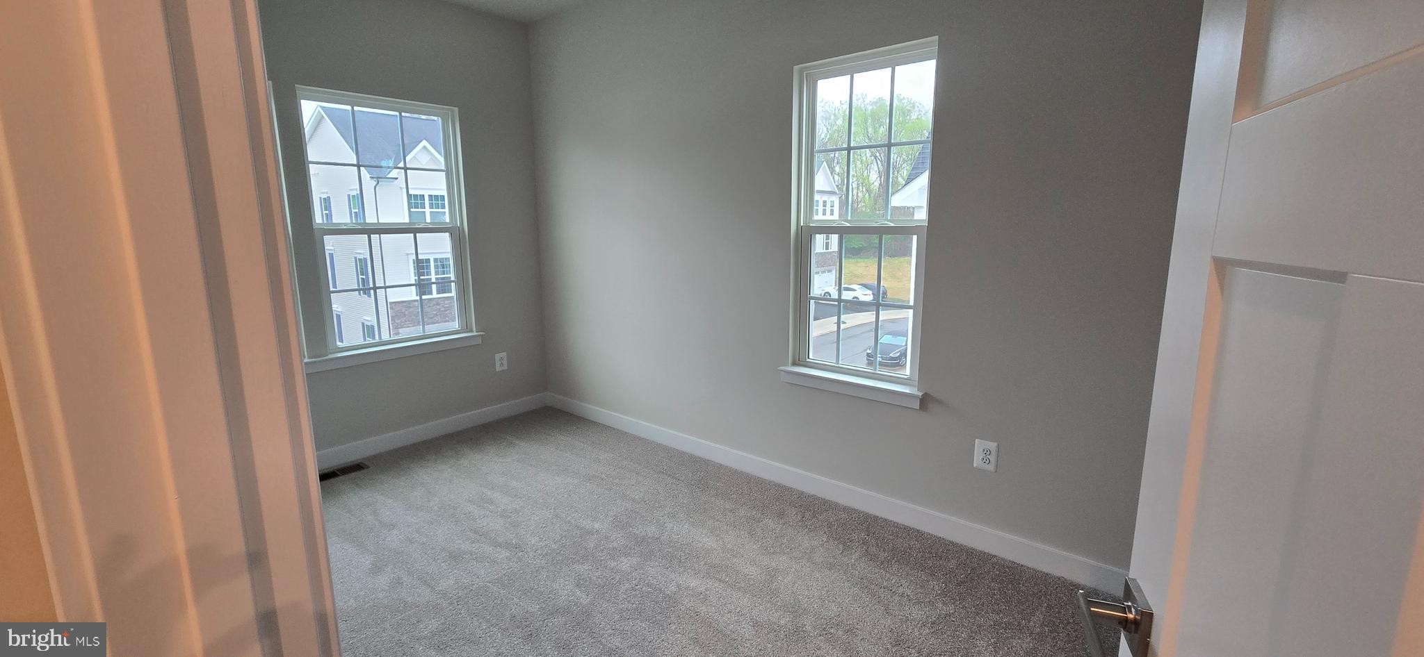 357 Marquis Street Frederick, MD 21702 - Photo 21 of 23 an empty room with windows