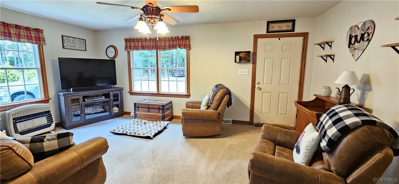 2405 Beulah Church Road St. Stephens Church, VA 23148 - Photo 12 of 18 a living room with furniture and a flat screen tv