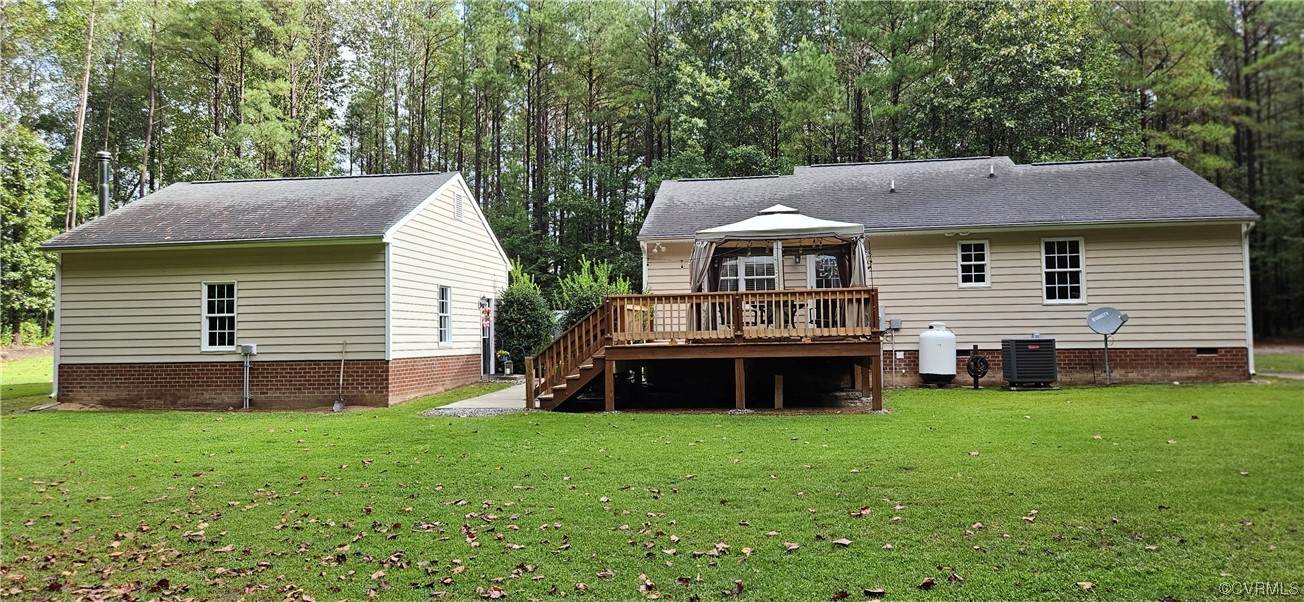 2405 Beulah Church Road St. Stephens Church, VA 23148 - Photo 6 of 18 a front view of a house with a yard and green space