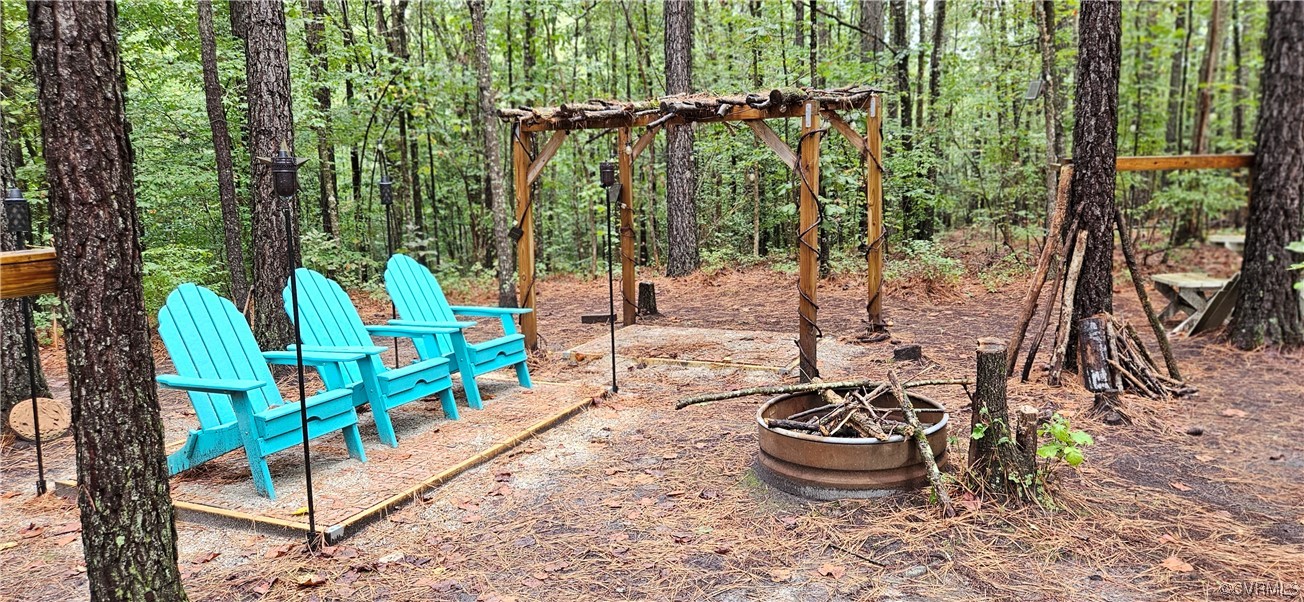 2405 Beulah Church Road St. Stephens Church, VA 23148 - Photo 9 of 18 a outdoor living space with furniture and garden view