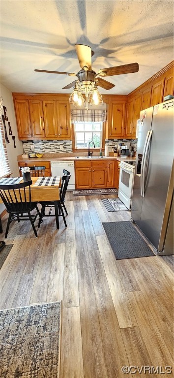 2405 Beulah Church Road St. Stephens Church, VA 23148 - Photo 10 of 18 a living room with stainless steel appliances kitchen island granite countertop a table chairs and a large window